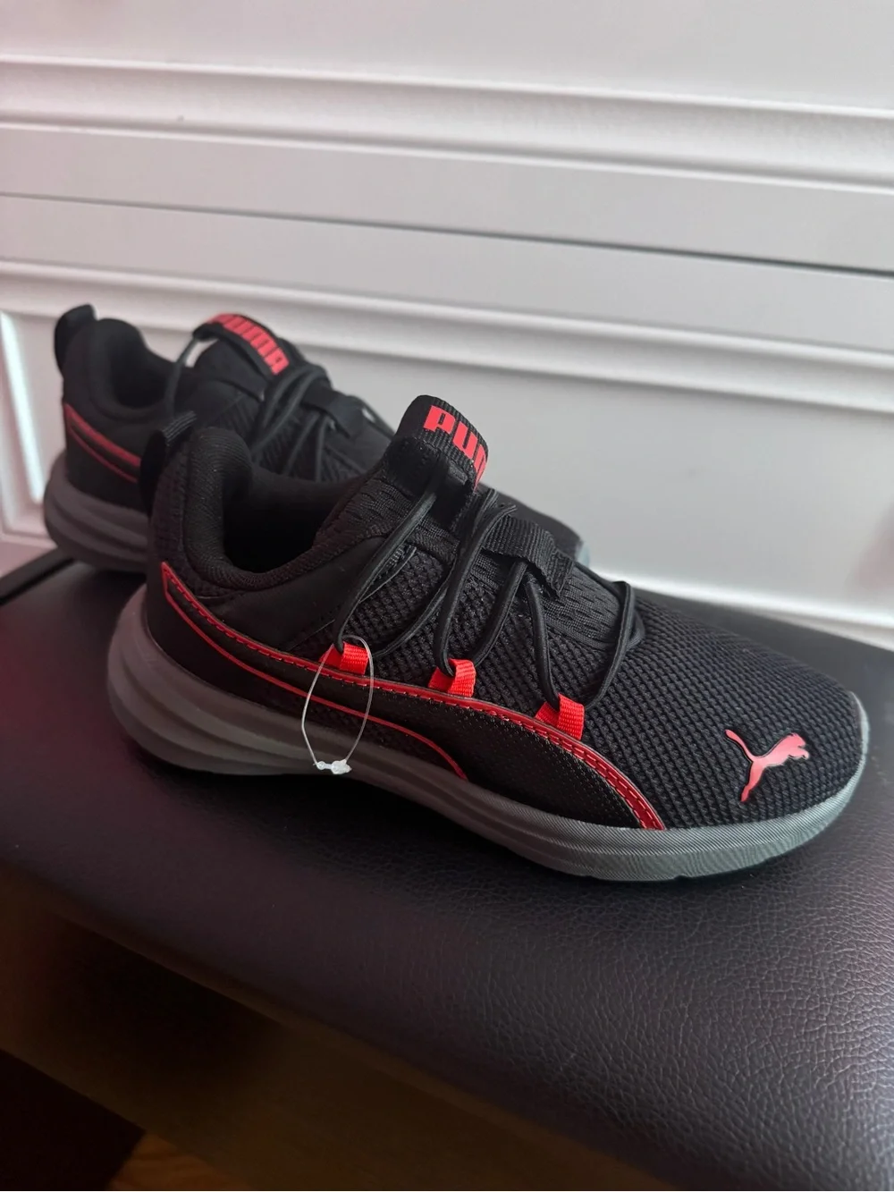 Puma Kids Black Sneakers with Red Accents